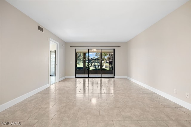 view of tiled empty room