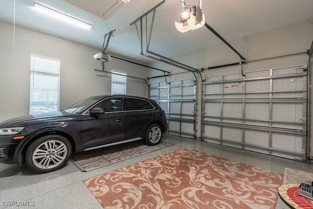 garage featuring a garage door opener