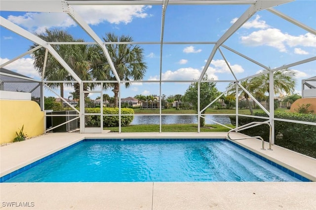 7912 Umberto Ct, Naples, FL 34114 - view of swimming pool with a water view, a patio area, and glass enclosure