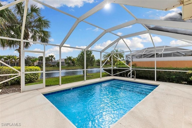 7912 Umberto Ct, Naples, FL 34114 - view of pool featuring a water view, a lanai, and a patio