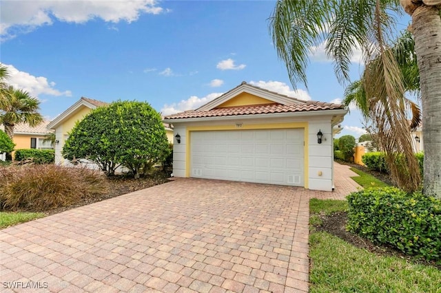 7912 Umberto Ct, Naples, FL 34114 - view of front of home with a garage
