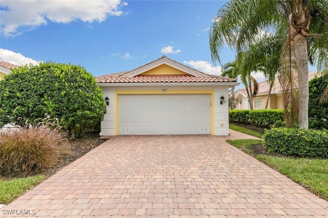 7912 Umberto Ct, Naples, FL 34114 - view of front of property with a garage