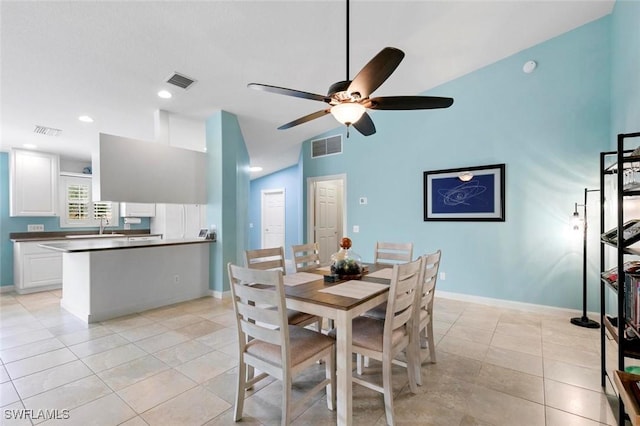 7912 Umberto Ct, Naples, FL 34114 - dining space featuring high vaulted ceiling, light tile patterned floors, and ceiling fan