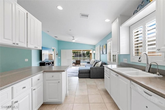 7912 Umberto Ct, Naples, FL 34114 - kitchen featuring sink, kitchen peninsula, white cabinets, and dishwasher