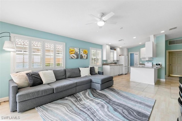 7912 Umberto Ct, Naples, FL 34114 - living room with vaulted ceiling, sink, light tile patterned flooring, and ceiling fan
