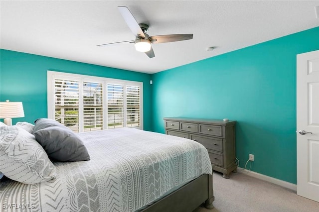7912 Umberto Ct, Naples, FL 34114 - bedroom with light colored carpet and ceiling fan