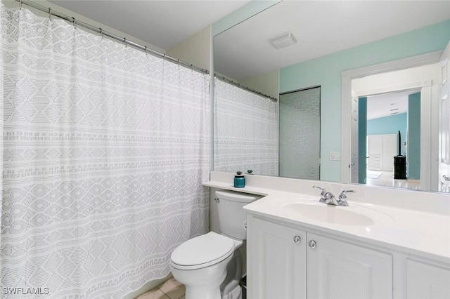7912 Umberto Ct, Naples, FL 34114 - bathroom with vanity, tile patterned floors, and toilet