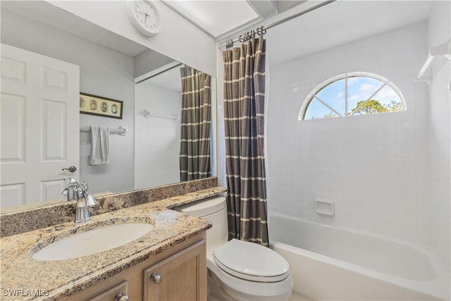 full bathroom with shower / bath combo, vanity, and toilet