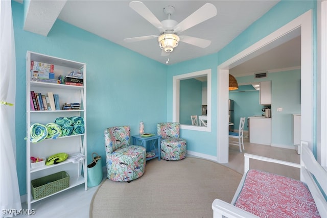 interior space featuring ceiling fan