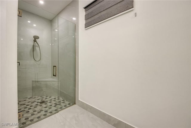 bathroom with an enclosed shower