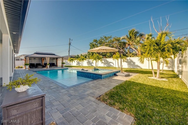 view of swimming pool with a gazebo, a yard, an in ground hot tub, and a patio