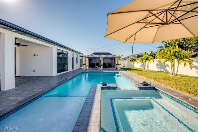 view of pool featuring a gazebo, a yard, and a patio area