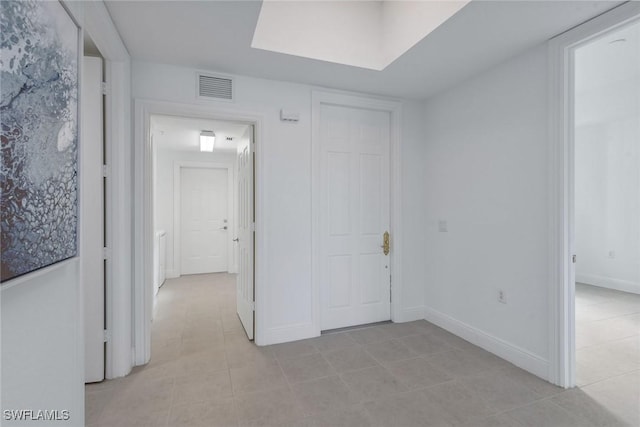 interior space with light tile patterned floors