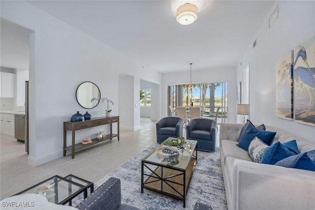 living room featuring light tile patterned floors