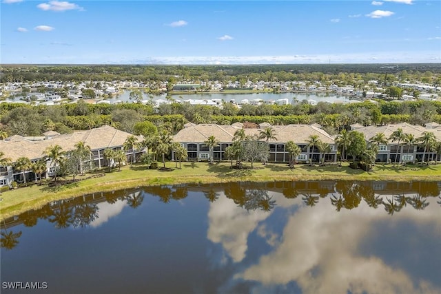 drone / aerial view with a water view