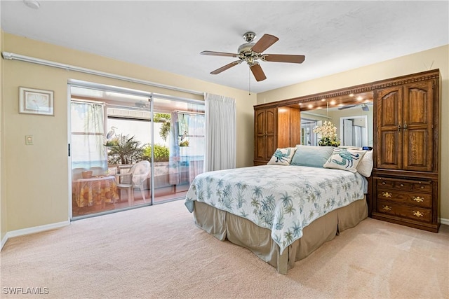 carpeted bedroom featuring ceiling fan and access to exterior