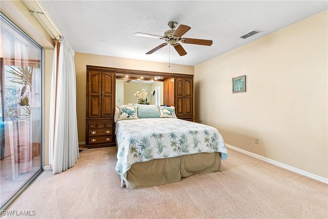 bedroom with ceiling fan, light colored carpet, and access to exterior