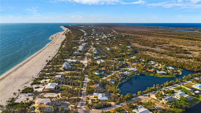 drone / aerial view with a view of the beach and a water view