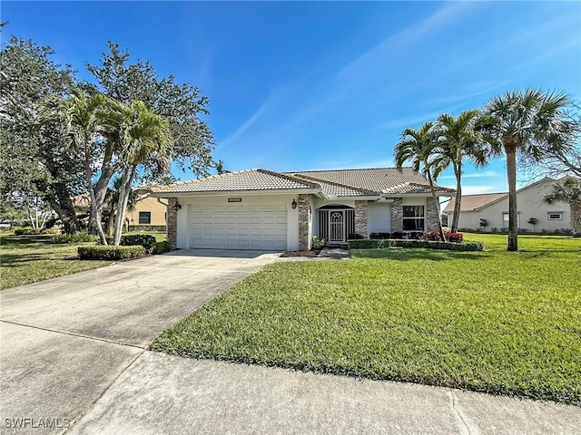 view of front facade with a garage and a front yard