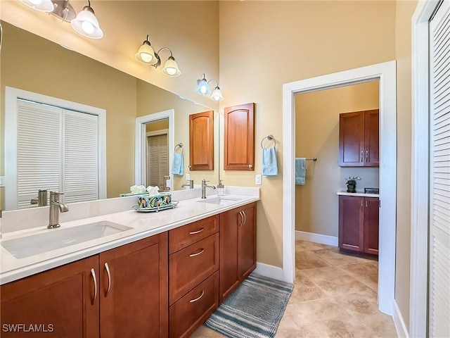 bathroom with vanity and tile patterned flooring