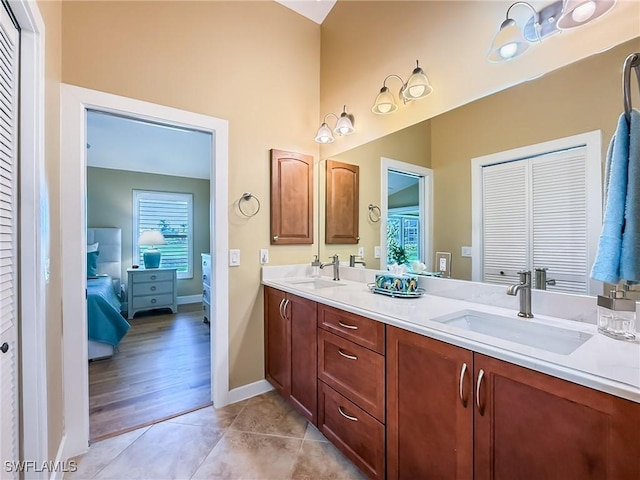 bathroom with vanity and tile patterned floors