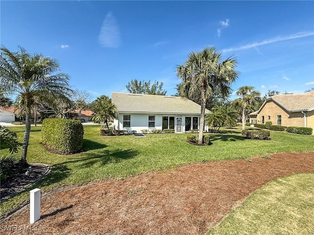 view of front of home with a front lawn