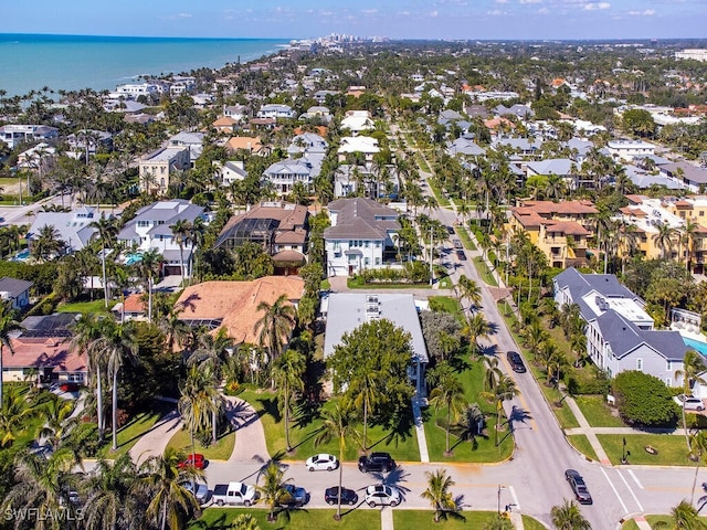 aerial view with a water view and a residential view