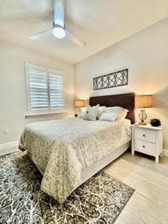 bedroom featuring ceiling fan