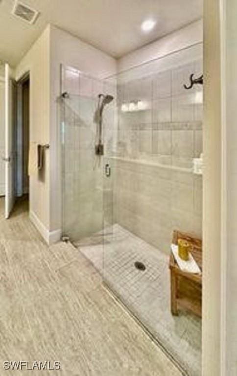 bathroom featuring walk in shower