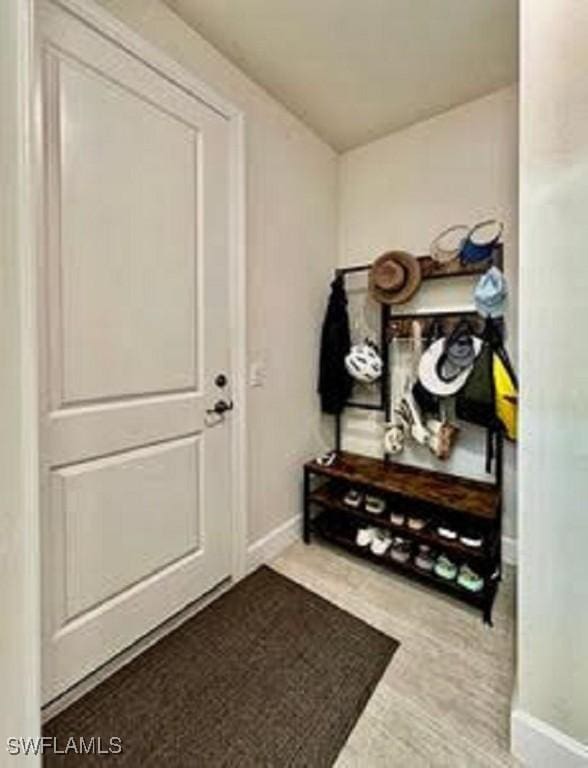 mudroom featuring baseboards