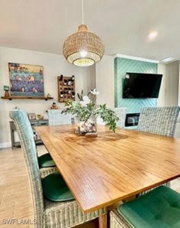 dining space featuring baseboards