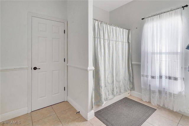 bathroom featuring tile patterned flooring