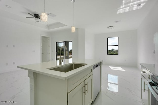 kitchen featuring a healthy amount of sunlight, sink, an island with sink, and dishwasher