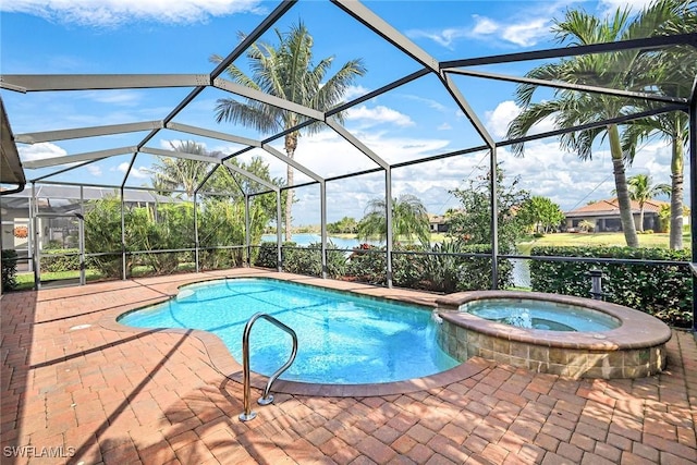 view of swimming pool with an in ground hot tub, glass enclosure, and a patio