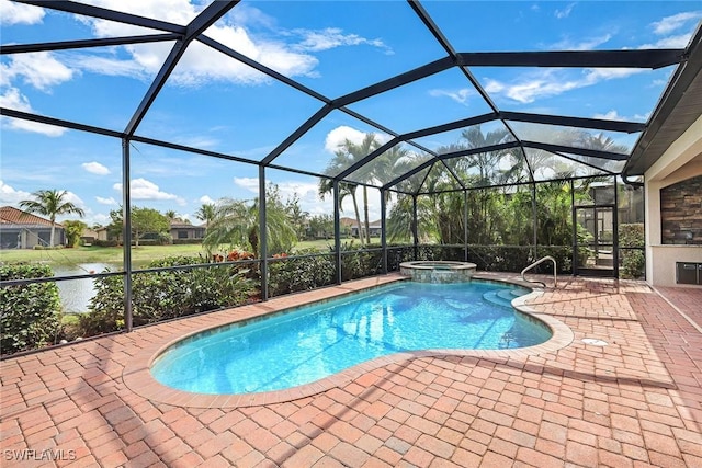 view of pool featuring a patio, a lanai, and an in ground hot tub