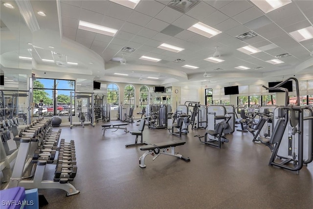 exercise room featuring a drop ceiling