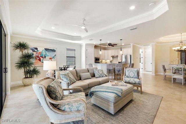 28131 Edenderry Ct, Bonita Springs, FL 34135 - living room featuring a raised ceiling, ceiling fan, ornamental molding, a chandelier, and light tile patterned flooring