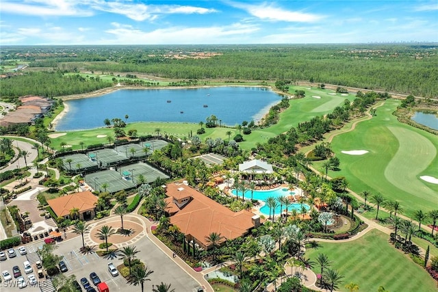 28131 Edenderry Ct, Bonita Springs, FL 34135 - drone / aerial view of a large body of water, a heavily wooded area, a local golf course, and a pool area