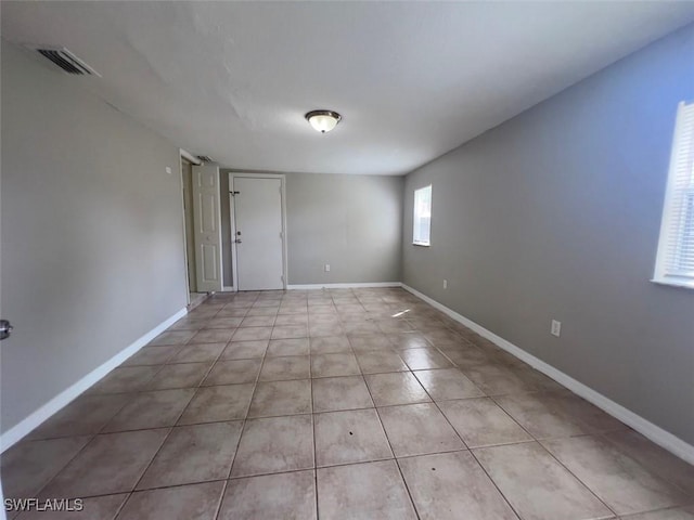 view of tiled spare room