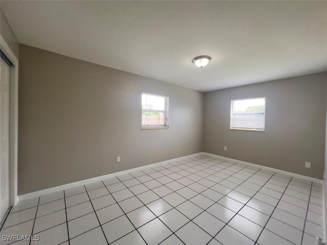 view of tiled spare room