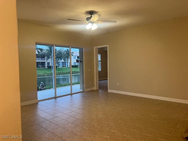 empty room featuring ceiling fan