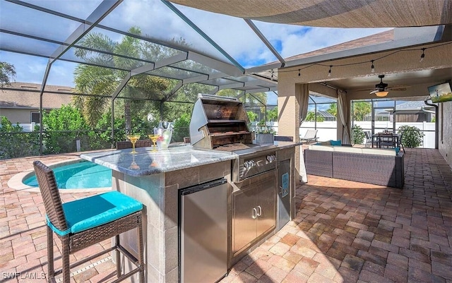 view of patio with area for grilling, a grill, an outdoor hangout area, and ceiling fan