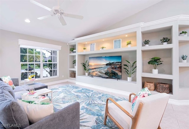 tiled living room featuring built in shelves, vaulted ceiling, and ceiling fan