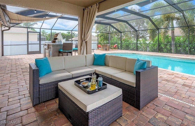 view of patio / terrace with an outdoor hangout area, glass enclosure, and exterior bar