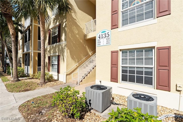 view of building exterior with central air condition unit