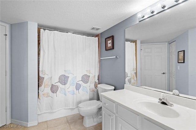 full bathroom with shower / tub combo with curtain, toilet, a textured ceiling, vanity, and tile patterned flooring