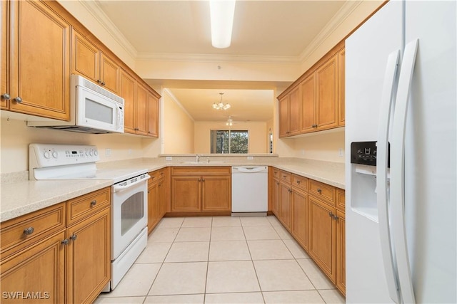 kitchen with sink, hanging light fixtures, light tile patterned floors, ornamental molding, and white appliances