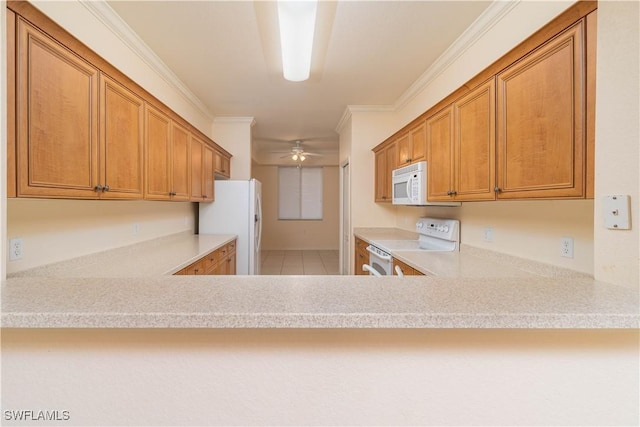 kitchen with white appliances, ceiling fan, light stone counters, ornamental molding, and light tile patterned flooring