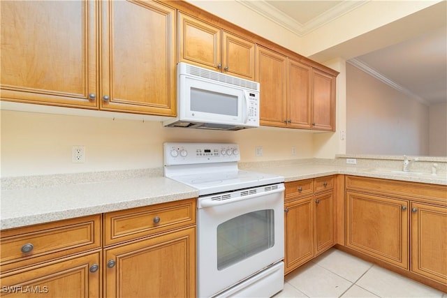 kitchen with sink, light tile patterned floors, light stone counters, crown molding, and white appliances