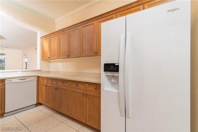 kitchen with white appliances, ornamental molding, and light tile patterned floors